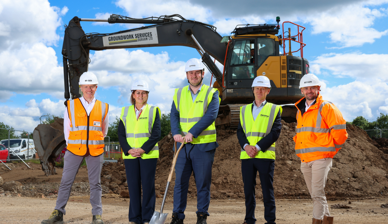 Team members from REGEN, Thirteen and Middlesbrough Council stand on a construction site to mark the start of works to build 40 new bungalows in Middlesbrough